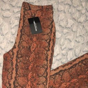 Tan straight leg snake print trousers
